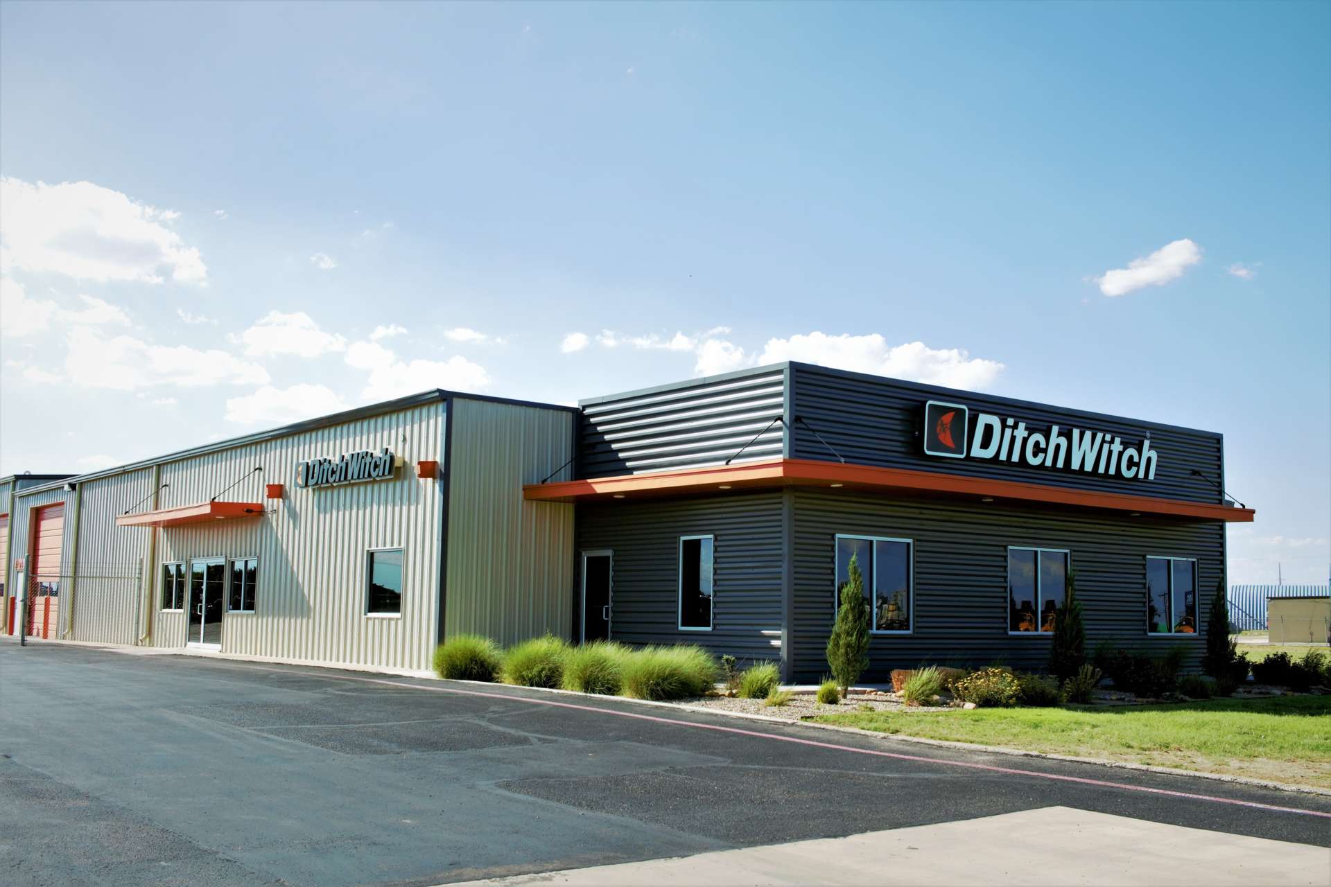 ditch witch building with light clouds in the back